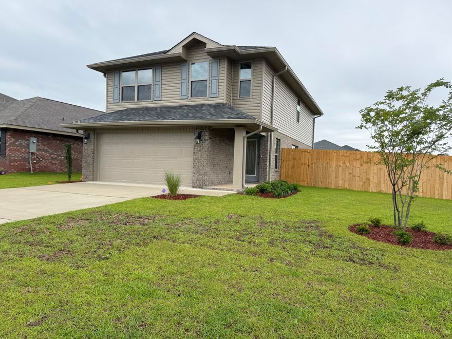 Beautiful 4-bedroom home in North Crestview! This 1,817 sq ft two-story home offers 4 bedrooms and 2.5 bathrooms, with all bedrooms conveniently located upstairs. The exterior features durable 4-sided brick and a fully finished 2-car automatic garage. Inside you'll find upgraded PureTech LVP flooring throughout the main living areas, with carpet only in the bedrooms and stairs. The kitchen and bathrooms feature granite or quartz countertops for a modern touch. Outside, enjoy a fully sodded yard with an irrigation system and professional landscaping. Neighborhood amenities include a community pool, sidewalks, and streetlights - perfect for family living! Fence, Blinds, Gutters, Fridge, Washer/Dryer ALL included and in the home.