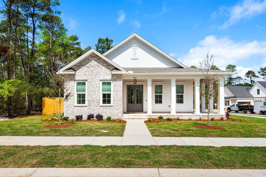 Well designed 4 bed, 2.5 bath home situated on a corner lot in the newest phase at Deer Moss Creek! Ph 11 features 102 lots boasting luxury homes! This beauty has a HUGE wrap-around porch with 2335 sq ft of a thoughtfully designed floor plan and custom finishes. The spacious great room features a large living space, dining area and gourmet kitchen. The kitchen has stainless steel, Kitchen Aid appliances. Gas stove, dishwasher, and refrigerator. A large center island/breakfast bar gives yet another space to gather ad you'll love the large butler's pantry w/ microwave. Beyond this area and down the hall are 4 bedrooms including a large primary suite, stunning primary bath and 10'x7' primary closet! There is an oversized garage measuring nearly 23'x24' too! Al Also down the hall is a powder room and laundry room. Practical features include LVP throughout with tile in wet areas, matte black plumbing and fixtures, custom lighting fixtures and more!