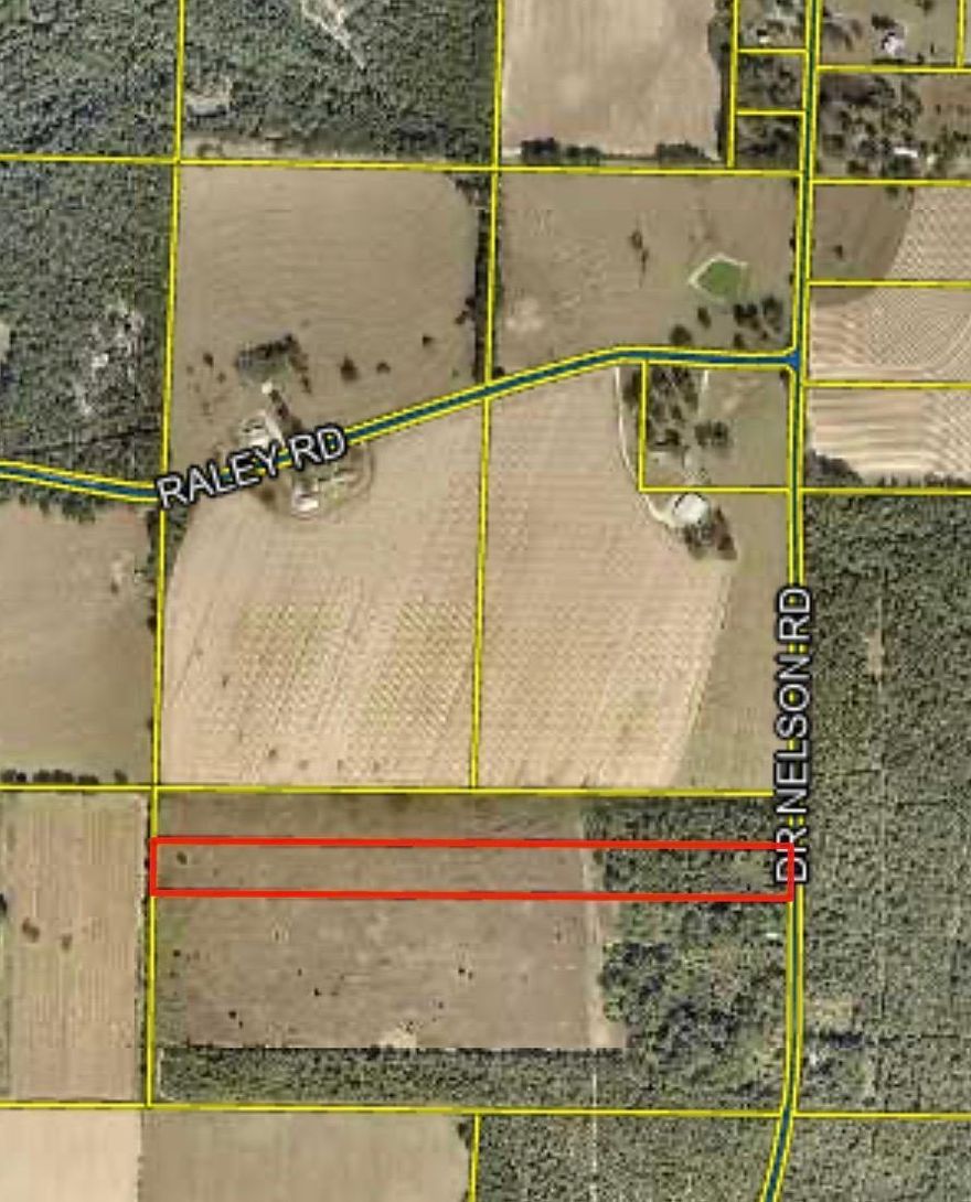 This beautiful +/- 13.33 acre property offers a level, wooded landscape with mature shade trees and pave road frontage.  The back half is partially cleared, providing a great balance of nature privacy and usable space.  Conveniently located close to town bordered by large adjoining parcels, it delivers both seclusion and accessibility.  This is the ideal setting for a homesite or retreat.