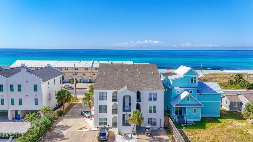 ANOTHER MAJOR PRICE IMPROVEMENT!!!!!  Properties in Nautilus Condo seldom become available--this is a rare chance to own a slice of paradise with stunning sunrises and sunsets.  Enjoy coastal living at its best in this sought-after second-floor condo with sweeping, unobstructed beach views. This boutique building offers just nine residences, no short-term rentals, and direct access to a dedicated stretch of sand--creating a peaceful seaside retreat. The well-designed layout includes two bedrooms and two bathrooms in just under 800 square feet, ideal for full-time living or relaxing escapes. Expansive windows capture the shoreline and fill the home with Gulf views.