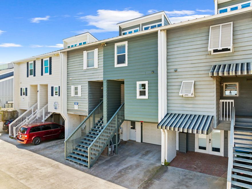 Experience true Gulf-front living in this beautifully updated 3-bedroom, 3.5-bath townhome, complete with a bonus/bunk room and a separate studio suite (ideal as a mother-in-law suite or lockout unit). Perfectly positioned directly on the Gulf, you can step from your private deck onto the sugar-white sands and emerald waters--your ultimate coastal retreat. This property has been extensively renovated with high-quality upgrades throughout. Exterior improvements include all-new Trex composite decking and upgraded railings (2025), expanded porches, added privacy walls on the first and second floors, and new windows and doors on all three levels. Interior updates feature LVP flooring throughout, KraftMaid cabinetry, quartz countertops, and a full suite of stainless and built-in appliances, including a Sharp dishwasher, drawer microwave, refrigerator, LG oven, and Hisense beverage fridge. Major systems have also been updated for peace of mind, including a new roof (2021), electrical panel (2023), complete plumbing replacement, new hot water heater, and updated HVAC system with new ductwork. The lower-level studio has been fully renovated with new sheetrock, quartz countertops, a kitchenette, Murphy bed, private living space, and its own mini-split A/C--perfect for guests or rental flexibility. Inside, you'll find light-filled, coastal-inspired interiors with neutral tones and custom finishes throughout. Multiple Gulf-front decks provide both covered and open spaces to relax, dine, and entertain while enjoying breathtaking sunsets year-round. Lovingly maintained as a personal residence and never rented by the current owner, this townhome offers a rare opportunity for a pristine beachfront property ready for your personal touch or creative investment vision. Conveniently located just minutes from Pier Park, Dolly Parton's Pirate Voyage Dinner & Show, Topgolf Panama City Beach, as well as local dining and shopping. Offered fully furnished and truly move-in ready--schedule your private showing today and start living the coastal lifestyle you deserve.