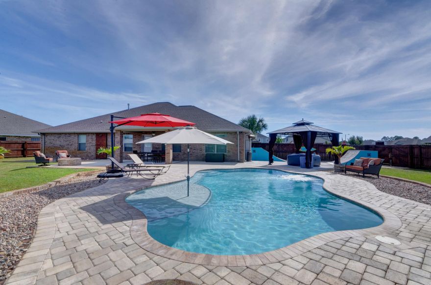 *POOL HOME* This stunning showstopper checks all the boxes on your dream home list! Perfectly located in The Meadows on an oversized 0.41 acre corner lot, put away your to do list and enjoy a move in ready all brick home full of upgrades. With an extended driveway and a three car garage, parking will never be an issue! Enter in the front door and to the right you'll find a formal dining room that opens to the kitchen, and to the left a flex room (currently used as a bedroom) perfect for an office, playroom, or man cave! 18x18 tile extends throughout the house (no carpet at all!), and past the open living room is a fantastic 26x12 enclosed Florida room. The gorgeous kitchen features granite countertops and a kitchen island, with perfectly accented backsplash and brand new (2018) appliances. The split floor plan allows the master retreat plenty of privacy and boasts his and her closets, double vanities, a separate soaking tub, and a massive walk in tiled shower with two shower heads! The other three bedrooms and two bathrooms are located on the other side of the house. Two bedrooms share an oversized bathroom between them, and spacious walk in closets are found throughout. As gorgeous as the inside is, the shining star of the home is the backyard oasis where paradise awaits! Installed just last year, the 18x32 ozone pool with therapy jets, 2 benches, a tanning ledge, and LED lights is exactly what you've been dreaming about! Have a boat or RV? Bring that too! A 55 foot pad is conveniently located on the side of the lot just inside the double gates (it currently houses the skate ramps which can convey or be removed). The outdoor storage shed is on a 10x12 concrete pad, and an outdoor shower is found on the side of the house for quick cleaning after backyard fun. Have peace of mind with a home survelliance system complete with 12 cameras, a keyless entry front door lock, and a termite bond. The Meadows features underground utilities. Move quickly to make this dream home your own!