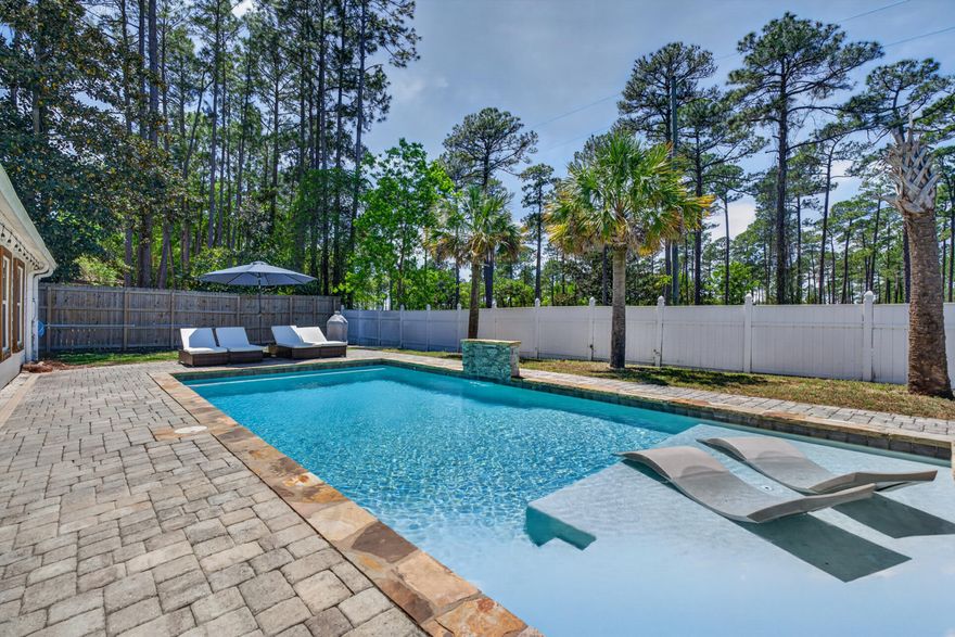 Discover the perfect blend of comfort, style, and location in this beautifully updated home situated on a spacious half-acre lot near the highly sought-after 30A corridor. Ideally positioned on a quiet cul-de-sac, this property offers a peaceful setting while remaining just minutes from the area's renowned white sand beaches, dining, and shopping. Step inside to a bright, inviting interior featuring an open and functional layout designed for both everyday living and entertaining. The well-appointed kitchen serves as the heart of the home, complete with new quarts countertops, new custom cabinetry, zeolite backsplash new Zline appliances including a gas range, and generous prep space. Outdoor living is equally impressive. The private backyard showcases a sparkling pool and ample space to relax, entertain, or enjoy Florida's year-round sunshine. The expansive lot offers flexibility for outdoor activities, gardening, or simply enjoying the natural surroundings.  Residents also enjoy access to a nearby community lake--perfect for fishing, picnicking, or unwinding in a scenic setting. With its combination of location, lot size, and thoughtful features, this property presents an exceptional opportunity to experience the best of coastal living near 30A.