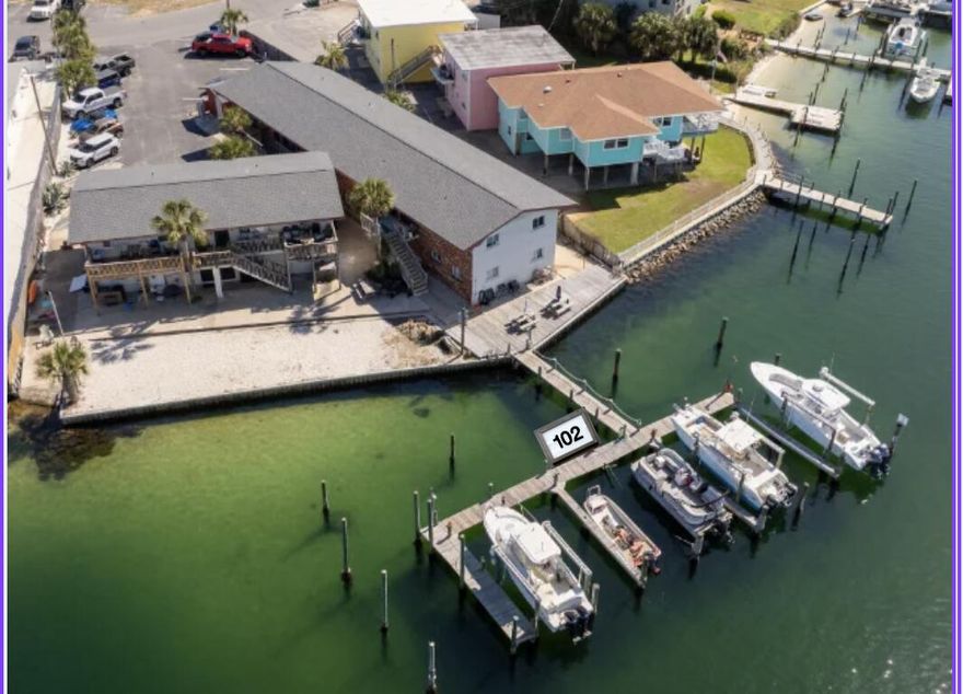VA Approved and your BOAT SLIP is leasable to the public if you don't have a boat. LOW HOA with this Short Term Rental on the sound. Experience easy coastal living in this beautifully updated first-floor sound side waterfront condo on Okaloosa Island. Offering the perfect blend of comfort, convenience, and waterfront views, this unit is ideal as a primary residence, vacation getaway, or investment opportunity. Inside, the condo has been recently repainted and features thoughtful upgrades throughout. The kitchen includes a recently replaced garbage disposal, while major systems provide added peace of mind with a new HVAC system and circuit breaker box (Oct 2024) and a water heater installed in 2020. The bathroom has been refreshed with a new vanity, and closets have been redone for improved storage and functionality. A new picture window (installation scheduled for end of April) will further enhance natural light and highlight the setting. Additional features include keyless entry and Ring cameras covering doors and windows, with rechargeable batteries (extra batteries provided). Located on the first floor for easy access, this sound side unit offers tranquil views across the water toward downtown Fort Walton Beach; perfect for enjoying seasonal fireworks and boat parades at the Landing. Community amenities include a small private beach for residents, a small boat launch (currently in works to be repaired), community laundry room and an assigned boat slip (leasable) with electricity and running water at the dock. Conveniently situated near public Gulf beach access, as well as local restaurants, shopping, and entertainment, this property combines coastal charm with everyday practicality in a highly desirable location.