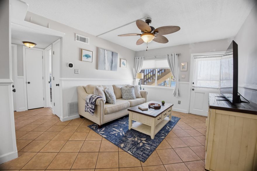 VA Approved. Boat slip Leasable to the public and lower HOA with this Short Term Rental that is , on the sound. Experience easy coastal living in this beautifully updated first-floor sound side waterfront condo on Okaloosa Island. Offering the perfect blend of comfort, convenience, and waterfront views, this unit is ideal as a primary residence, vacation getaway, or investment opportunity. Inside, the condo has been recently repainted and features thoughtful upgrades throughout. The kitchen includes a recently replaced garbage disposal, while major systems provide added peace of mind with a new HVAC system and circuit breaker box (Oct 2024) and a water heater installed in 2020.  The bathroom has been refreshed with a new vanity, and closets have been redone for improved storage and functionality. A new picture window (installation scheduled for end of April) will further enhance natural light and highlight the setting. Additional features include keyless entry and Ring cameras covering doors and windows, with rechargeable batteries (extra batteries provided). Located on the first floor for easy access, this sound side unit offers tranquil views across the water toward downtown Fort Walton Beach; perfect for enjoying seasonal fireworks and boat parades at the Landing. Community amenities include a small private beach for residents, a small boat launch (currently in works to be repaired), community laundry room and an assigned boat slip (leasable) with electricity and running water at the dock. Conveniently situated near public Gulf beach access, as well as local restaurants, shopping, and entertainment, this property combines coastal charm with everyday practicality in a highly desirable location.