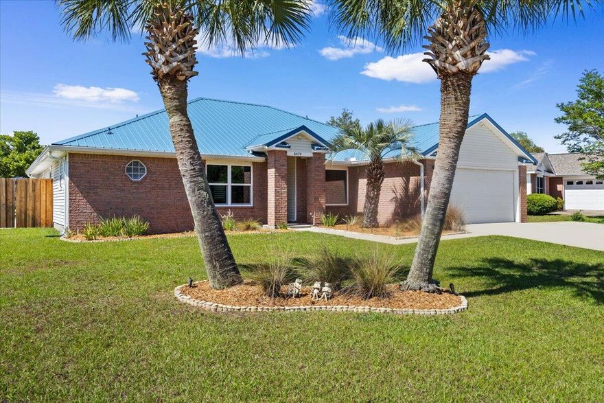 Welcome to your private coastal retreat in the highly sought-after waterfront community of Lighthouse Pointe! Situated on a spacious corner lot, this beautifully updated 4-bedroom, 2-bath pool home blends modern upgrades with effortless Florida living.

Step inside to discover a bright, open living space featuring vaulted ceilings, abundant natural light, and new impact windows for peace of mind. The heart of the home is the stunning updated kitchen, complete with quartz countertops, soft-close cabinetry, and brand-new appliances--perfect for both everyday living and entertaining. A formal dining room adds versatility for gatherings and special occasions.

The spacious primary suite is a true escape, showcasing a tray ceiling, dual closets, a double vanity, and a custom-tiled shower. Enjoy Welcome to your private coastal retreat in the highly sought-after waterfront community of Lighthouse Pointe! Situated on a spacious corner lot, this beautifully updated 4-bedroom, 2-bath pool home blends modern upgrades with effortless Florida living.

Step inside to discover a bright, open living space featuring vaulted ceilings, abundant natural light, and new impact windows for peace of mind. The heart of the home is the stunning updated kitchen, complete with quartz countertops, soft-close cabinetry, and brand-new appliances--perfect for both everyday living and entertaining. A formal dining room adds versatility for gatherings and special occasions.

The spacious primary suite is a true escape, showcasing a tray ceiling, dual closets, a double vanity, and a custom-tiled shower. Enjoy direct access to your backyard oasis through double sliding doors that open to the private pool with a brand-new liner-ideal for relaxing or hosting guests year-round.

Step outside to your covered patio retreat, complete with a hot tub beneath a 2023-installed enclosure--offering a comfortable, shaded space to unwind, entertain, or enjoy peaceful evenings outdoors.

Additional highlights include luxury vinyl plank flooring, updated bathrooms, fresh paint, modern lighting, and a Tesla charger in the garage, Govee exterior lighting. Major systems have been thoughtfully updated, including a new metal roof (2024), HVAC (2020), and water heater (2020), offering both style and long-term peace of mind.

Beyond the home, Lighthouse Pointe offers an exceptional coastal lifestyle with sidewalks, underground utilities, two playgrounds, and a waterfront park complete with picnic areas, a beach, and a fishing pier on the Santa Rosa Sound. Whether you're enjoying sunsets by the water or relaxing poolside at home, this property delivers the best of Gulf Breeze living.

Don't miss your opportunity to own a move-in-ready home in one of the area's most desirable waterfront communities!