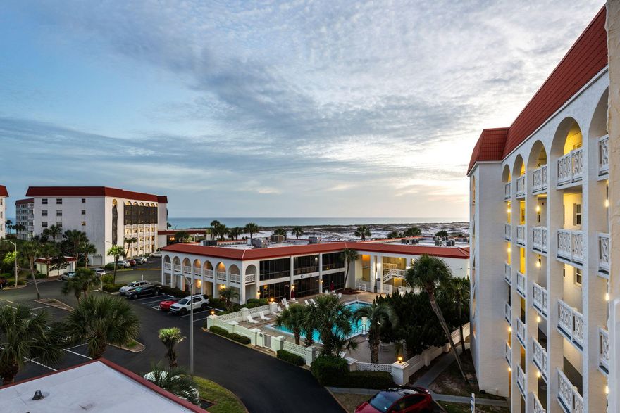 Welcome to effortless coastal living with stunning water views from the 5th floor. This beautifully updated condo offers a front-row seat to breathtaking sunsets, with a private balcony overlooking the serene sound - perfect for relaxing and watching boats pass by. Set within a well-maintained 13-acre beachfront community, residents enjoy an exceptional range of amenities including two pools (one heated and one beachfront), a full fitness center, sauna, spa, tennis courts, gazebo, 24-hour security, and community spaces for gatherings, along with a variety of activities. The unit has been thoughtfully renovated in 2025 with stylish, modern upgrades throughout, including a brand-new kitchen with granite countertops, all new appliances, Lifeproof flooring, updated lighting, and new doors. Both bathrooms feature new vanities with granite tops and upgraded fixtures. Additional improvements include a new water heater, all new furniture, and updated window treatments with blinds and curtains. A perfect blend of comfort, style, and coastal charm. Welcome to your own piece of paradise!