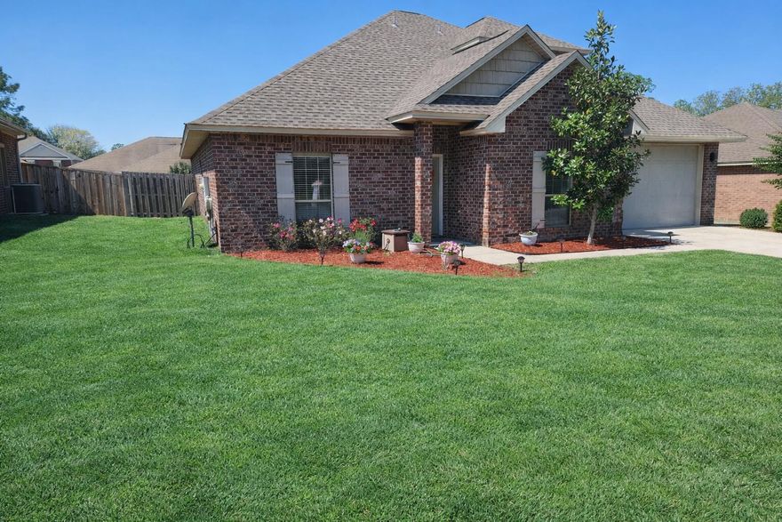 LOCATION, LOCATION, LOCATION!  Positioned south of I-10 in one of Crestview's most convenient and commuter-friendly areas, this large all-brick home offers exceptional access to the 7th Special Forces Group, Duke Field, Eglin AFB, Hurlburt Field, shopping, dining, and the white-sand beaches of the Emerald Coast. The interior features an open and functional floor plan with laminate wood flooring throughout the main living areas and neutral finishes. The spacious kitchen has granite countertops, stainless steel appliances, crown molding, a butcher-block island, and ample cabinetry, making it ideal for both everyday living and entertaining. The main-level primary suite offers a private retreat with a large walk-in closet, double vanity, garden tub, and a walk-in granite shower. Secondary bedrooms are generously sized and provide flexibility for family, guests, or home office use. Upstairs, a large bonus living area with its own full bath adds exceptional versatility and can easily serve as a media room, guest suite, playroom, or additional living quarters. Outdoor enjoyment is enhanced by a privacy-fenced backyard and patio area, perfect for relaxing or hosting gatherings. Major system updates provide added peace of mind, including a newer roof installed in March 2022, a new HVAC system in April 2025, and a new water heater installed in January 2026. This well-located and move-in-ready home offers space, functionality, and convenience in one of Crestview's most established communities.