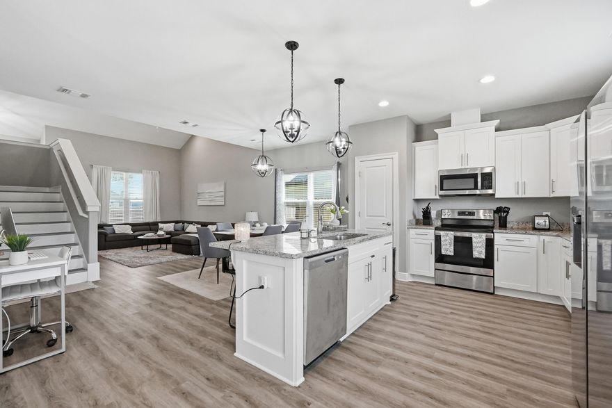 Welcome to 2331 Hadleigh Hills Court a beautifully maintained 2022 Robbins Builders home offering modern finishes, functional living spaces, and easy access to Navarre Beach, Hurlburt Field, shopping, dining, parks, and Highway 98.
Inside, the open-concept layout creates a natural flow between the kitchen and two spacious living areas, making the home feel both comfortable and connected. Large windows bring in abundant natural light, giving the main living spaces a bright and welcoming atmosphere.The kitchen serves as the heart of the home and features white shaker cabinetry with crown molding, granite countertops, stainless steel appliances, an undermount sink, and a large center island with bar seating and additional prep space. Luxury vinyl plank flooring runs throughout the home, offering durability, easy maintenance, and a clean modern look.
The primary suite provides a relaxing retreat with dual granite vanities, undermount sinks, and an oversized tiled walk-in shower. Three additional bedrooms offer flexibility for guests, a home office, hobbies, or additional living space. The covered back patio overlooks a privacy-fenced backyard with a peaceful setting and no direct rear neighbors. Additional features include an EV charger in the garage, built-in hurricane shutter system with custom fabric shields, and a hot tub that conveys with the property.
Designed with both comfort and functionality in mind, this home offers a modern layout, thoughtful upgrades, and a peaceful setting all within minutes of the Emerald Coast lifestyle buyers love.