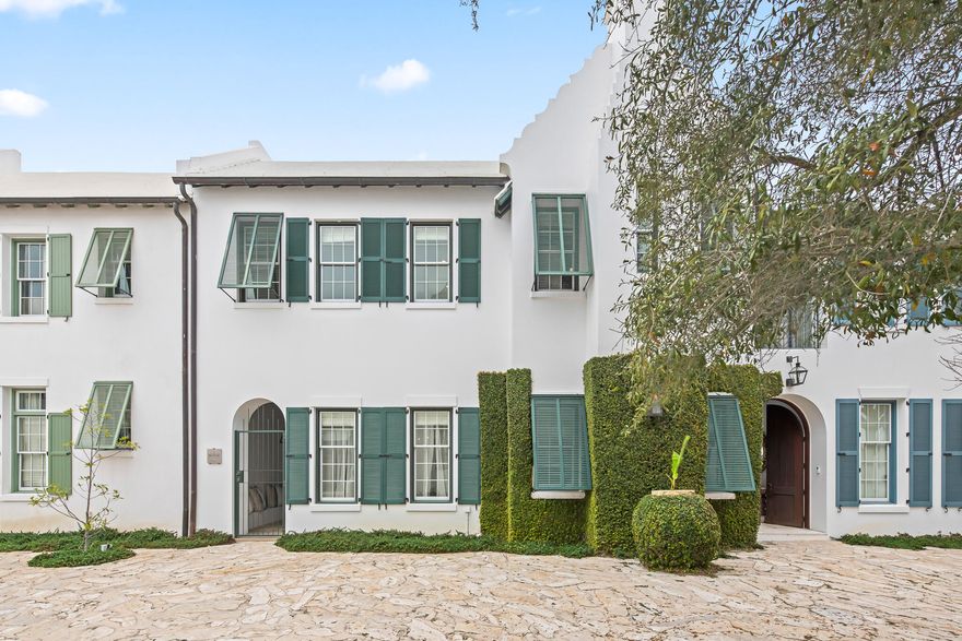 Welcome to 36 Seven Wells Court, a stunning residence in the heart of Alys Beach, designed by renowned architect Stephen Mouzon. This exquisite three-bedroom, 3.5-bath home boasts 2,403 square feet of thoughtfully curated living space, ideally situated along the picturesque Sea Garden walk pedestrian path. This property is a proud representation of the Bermuda-inspired architectural style that defines Alys Beach, having been conceived during the initial architectural design charette that shaped this iconic community.

Upon entering, you are greeted by a beautifully landscaped private courtyard featuring a refreshing swimming pool and inviting covered patios, perfect for relaxation and outdoor gatherings. The interior captivates with custom Venetian plaster adorning the walls and ceilings, creating an elegant atmosphere. The open-concept kitchen seamlessly connects to the living area, with a charming dining room that frames views of the tranquil courtyard, making it perfect for entertaining.

The primary suite, conveniently located on the first level, offers serene views of the courtyard and includes its own private garden courtyard, providing an oasis of peace and privacy. Upstairs, two guest suites each feature en suite bathrooms, while a cozy sitting area or bunk space at the stair landing adds versatility for additional sleeping arrangements or a workspace.

This distinctive home embodies a unique charm and sophistication, making it a perfect sanctuary for even the most discerning homeowner. Experience the allure of Alys Beach at its finest--schedule your private showing today!