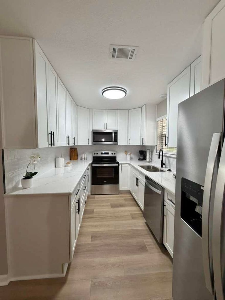 2026 AC 2013 Roof, 2026 Hot Water Heater. 2012 septic. Front photo staged with new sod. Seller will be not be installing sod..  100% Updated 4BR/2.5BA on nearly ½ acre with a 2-car detached garage.
New AC, full rewire, brand-new kitchen with granite and stainless steel appliance package, updated baths, all new flooring, tile floors in bathrooms, new fans and lighting, fresh interior and exterior paint, new textured ceilings, and a huge family room. Extremely neat, fully renovated, and truly move-in ready. Priced to sell.
Includes full-size 2-car detached garage.