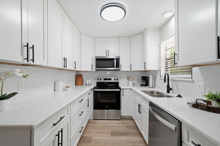 2026 AC & Water Heater; 2013 Roof, 2014 New Septic, pumped out located in backyard, on left side of back of home. Front photo staged with new sod. Seller will not be installing sod. 100% Updated 4BR/2.5BA on nearly ½ acre with a 2-car detached garage. New AC, full rewire, brand-new kitchen with granite and stainless steel appliance package, updated baths, all new flooring, tile floors in bathrooms, new fans and lighting, fresh interior and exterior paint, new textured ceilings, and a huge family room. Extremely neat, fully renovated, and truly move-in ready. Priced to sell.
Includes full-size 2-car detached garage.