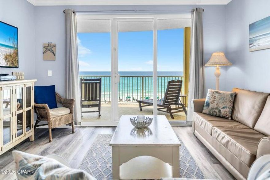 Bright, spacious, and ideally positioned on the 4th floor, this residence at Emerald Isle offers an exceptional blend of comfort, style, and investment potential. Designed for both personal enjoyment and strong rental performance, the layout comfortably accommodates up to six guests while maintaining an open, airy feel throughout. Nine-foot ceilings, crown molding, and expansive sliding glass doors flood the living space with natural light while framing stunning Gulf views. The property conveys fully furnished with high-end furniture and accessories, making it truly move-in or rental ready. Luxury vinyl plank flooring runs throughout, delivering a clean, modern look with durability suited for beachside living.