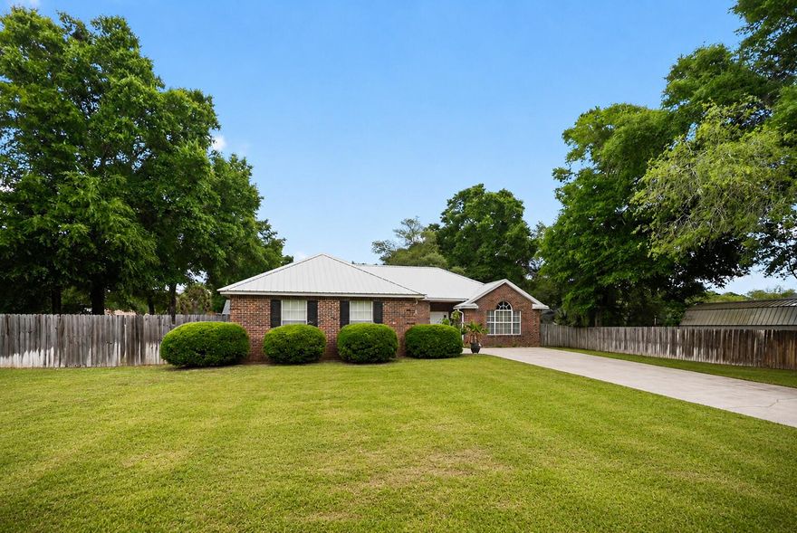 Secure your South Crestview sanctuary where convenience and durability meets well established and family vibes. Experience the peak of Florida living in this impeccably updated retreat. A new chef's kitchen with sleek granite counters and a gas range turns every meal into a celebration. Total peace of mind is yours with a 2025 metal roof and 2020 HVAC, ensuring years of worry-free comfort. The backyard features a dedicated RV gate, perfect for securing your weekend toys in a private, quiet oasis. Located in a walkable, established neighborhood with mature trees, this home blends timeless charm with modern resilience. Opportunities in this coveted corridor at this price vanish instantly--claim your turnkey lifestyle before it's gone.