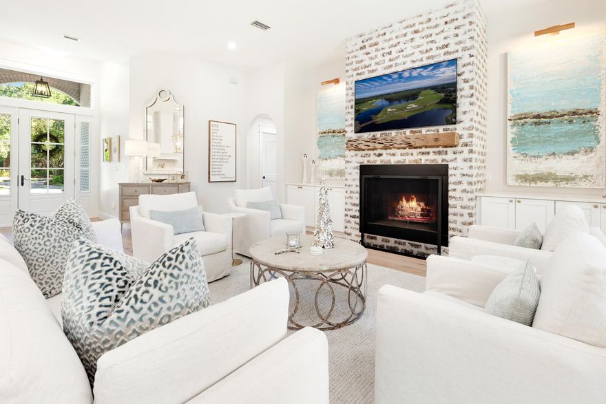 Welcome to 228 Matties Way, an exquisite lakefront retreat that perfectly balances timeless elegance with modern sophistication. Completely renovated from 2023 to 2025, this stunning home showcases exceptional craftsmanship, designer finishes, and sweeping views of Lake Rangia. Every detail has been thoughtfully curated to create a residence that is both beautiful and highly functional. Step inside to an inviting open-concept interior where luxury and comfort meet -The designer kitchen has been totally transformed with custom cabinetry, premium quartz countertops, and top-of-the-line Sub-Zero, Cove, and Wolf appliances. Undermount lighting and a custom tile backsplash add both warmth and sophistication. In the living area, a new wood-burning fireplace with a custom cypress mantle and quartz-topped built-ins creates a cozy yet refined focal point, while the adjoining dining room features a brick accent wall that ties seamlessly into the home's design. The fully renovated bathrooms, including the master, Jack & Jill, and guest baths, feature high-end finishes and elegant detailing throughout. A custom ''Her's'' master closet provides a beautifully organized space with fully customized storage solutions. Throughout the home, you'll find new flooring, recessed lighting, designer fixtures, custom interior shutters, and solid two-panel doors with premium hardware. Every doorway, window, and baseboard has been finished with elegant, stacked header trim, and the entire interior - including ceilings, walls, and trim - has been freshly painted. A new Trane 5-ton HVAC system ensures year-round comfort and energy efficiency. The exterior has been equally transformed with every element upgraded for beauty, durability, and peace of mind -
All windows and doors have been replaced with hurricane-impact-rated models, complemented by hurricane-rated garage doors and a new roof installed in August 2021.
The screened back porch, finished with a pine tongue-and-groove ceiling and stone tile flooring, offers the perfect place to relax while enjoying tranquil lake views.
A new paver driveway, upgraded exterior lighting, and a rebuilt irrigation system complete the thoughtful exterior enhancements.
Set on one of the most desirable lots in Kelly Plantation, this property offers breathtaking views of Lake Rangia, a deep manicured backyard, and the serene beauty of the bird sanctuary beyond your porch. Best of all, it sits in Flood Zone X, so no flood insurance is required.
Located within the exclusive gated community of Kelly Plantation, residents enjoy world-class amenities including a meticulously maintained championship golf course, golf clubhouse with bar and grill, ballroom, and restaurant.
A separate Owner's Club offers spaces for meetings and events with both large and small rooms, full kitchen facilities, and a state-of-the-art fitness center. Outdoor recreation abounds with tennis, pickleball, and basketball courts, scenic nature trails, a dog park, and an equestrian center. Just a short golf cart ride away are Destin's iconic sugar-white beaches, along with the area's finest dining, boutique shopping, championship golf, and world-class fishing.

With every major system, finish, and detail recently updated, 228 Matties Way is truly move-in ready. This home embodies the perfect blend of luxury, functionality, and natural beauty - all in a serene and private lakefront setting within one of Destin's most sought-after communities.