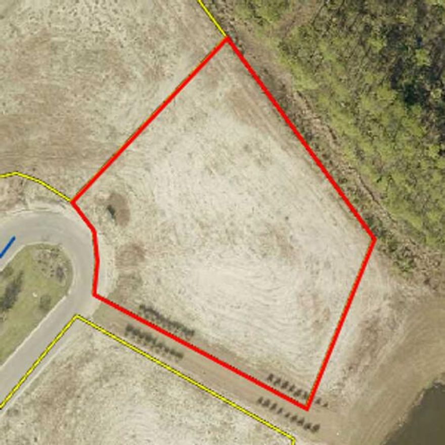 One of the largest available homesites in WaterSound Camp Creek at approximately 0.6 acres, offering a rare opportunity to build a custom estate in one of 30A's premier gated communities. Conceptual plans and renderings available, with the homesite capable of accommodating a residence up to approximately 14,000 SF with expansive indoor/outdoor living potential. The south side setback has been waived by the HOA due to the adjacent easement, providing added design flexibility. The rear of the property overlooks a pond and wooded preserve areas with planned HOA fountain and aeration enhancements by year-end 2026. Ideally located near Camp Creek Golf Club, Watersound Town Center, Scenic Highway 30A, Rosemary Beach, and Alys Beach.