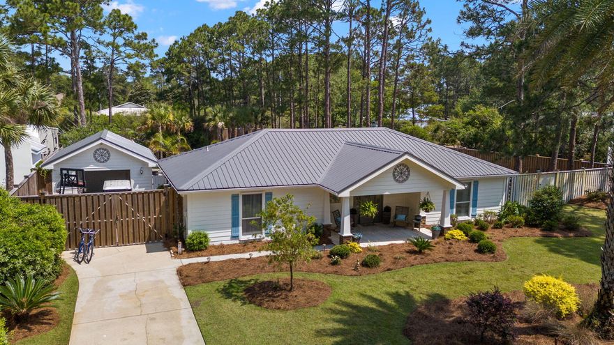 Experience a rare sense of space, tranquility and investment potential at 10 Fairway Drive. Situated on a oversized 0.58-acre corner lot in the coveted non-HOA community of Santa Rosa Ridge, this property offers a ''room to breathe'' feel that is challenging to find along the 30A corridor. Freshly painted and topped with a brand new custom-color metal roof, this home arrives maintenance-free, turnkey rental ready and fully furnished. The crown jewel of this estate is the expansive backyard coastal oasis, surrounded entirely by an 8-foot privacy fence. At its heart lies a rare coastal dune pond--a self-sustaining ecosystem stocked with bass, bream, and catfish, perfect for a quiet John-boat ride or a morning of fishing. The grounds are rounded out by a resort-style pool, fire pit, stunning mature landscaping and white peach trees.  Maximize your ROI with this turnkey, fully furnished gem featuring a proven rental history and active bookings already in place. The main residence offers single-story living with four bedrooms plus a dedicated bunk room that comfortably sleeps 10. Expanding the footprint is a detached, climate-controlled carriage house--a versatile flex space currently serving as a game room but easily converted to a fifth bedroom or private office. With vaulted ceilings, a chef's kitchen, and a prime location minutes from the beach and local amenities, this property offers the space and flexibility typically reserved for a much higher price bracket.