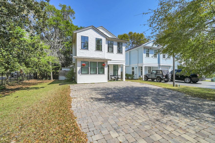 Walk to the bay and enjoy coastal living in this beautifully upgraded Florida cottage in sought-after Sacred Oaks. The community offers a shared boat dock, brick-paved streets, underground utilities, and a scenic walkover to the open bay.

This 3-bedroom, 2.5-bath home features 1,866 sq ft of thoughtfully designed space with an open-concept layout and elevated finishes throughout. The updated kitchen shines with ceiling-height cabinetry, an expanded island, quartz countertops, subway tile backsplash, and custom details. The primary bath has been transformed into a spa-like retreat.

Additional highlights include a metal roof, spray foam insulation, and a private backyard with a stained wood deck--perfect for relaxing or entertaining.
