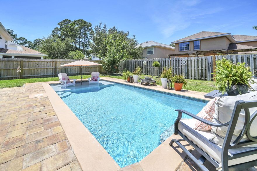 Beautiful 4-bedroom, 3-bath home in the desirable Driftwood Estates community featuring 2,244 square feet of well-designed living space and a backyard oasis with a private pool added by the current owners. The open floor plan offers a spacious living area ideal for entertaining, while the kitchen features stainless steel appliances, abundant cabinet and counter space, pantry storage, and a large eat-in dining area with direct access to the covered patio and backyard. The upstairs primary suite includes a garden tub, separate shower, double vanity, and oversized walk-in closet. The fully fenced backyard provides exceptional outdoor living space for relaxing, grilling, and entertaining. Driftwood Estates offers ponds, a neighborhood park, and a convenient location near Choctawhatchee Bay, shopping, dining, Grand Boulevard, Sacred Heart Hospital, and the Emerald Coast's white sand beaches.