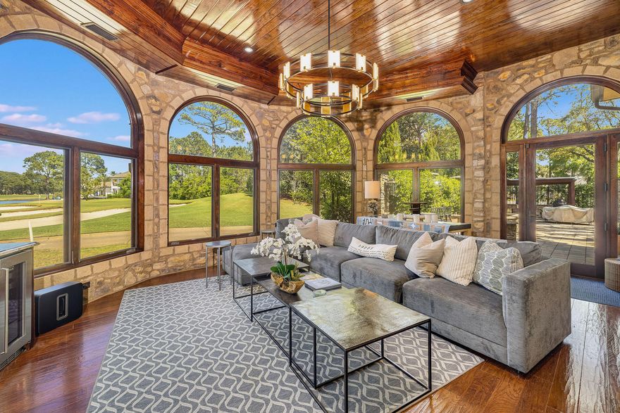 Remarkable detail in this unique, memorable, Tuscan Villa in Sandestin. Located near the 12th green of Raven golf course, the views are maximized from window-wrapped circular rooms and beautiful outdoor living spaces. Perfect for entertaining large groups, this home has 2 large kitchens featuring granite counter-tops, custom cabinetry, Viking appliances, warming drawer, and breakfast bar. The second kitchen is equipped with a 13' commercial grade Twin Eagle Tepanaki grill, Twin Eagle BBQ grill, and Twin Eagle 60,000 BTU burner with high grade Stainless Steel and LED lighting. There is a custom wine cellar. Expansive master suite with steam shower, finishes include natural stone and distressed wood flooring, custom wood doors and iron work