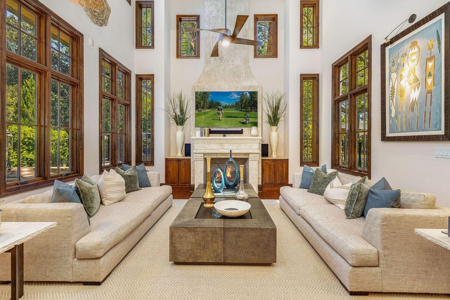 Experience the refined elegance and luxurious amenities of this stunning Tuscan Villa-inspired residence. Positioned near the 12th green of the Raven golf course, the home is thoughtfully designed to maximize breathtaking views through window-wrapped circular rooms and spacious outdoor living areas. This home is ideal for hosting large gatherings, offering a dedicated wine room and two expansive kitchens. The primary kitchen boasts Viking appliances and a convenient breakfast bar,  The second kitchen, located in the Sun Room, is a chef's dream, equipped with a 13-foot commercial-grade Twin Eagle Teppanyaki grill, a Twin Eagle BBQ grill, and a powerful Twin Eagle 60,000 BTU burner, all made from high-grade stainless steel and enhanced with LED lighting. The Primary suite serves as a LED lighting. The Primary suite serves as a private retreat, featuring an ensuite bathroom with a relaxing steam shower, a cozy fireplace, a comfortable sitting area, a dedicated study, and a balcony that overlooks the scenic golf course. Beautifully landscaped outdoor spaces that include a fountain and fire pit, provide the perfect setting for entertaining guests or simply unwinding in a tranquil environment.  Located on the premier Golf Course Lot in Tuscana inside the Sandestin Golf & Beach Resort, this home is convenient to the very best shopping, dining, Beaches, Golf, Tennis, Pickleball, Marina, Boating, and year-round events!