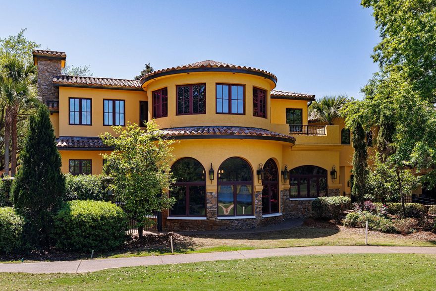 Remarkable detail in this unique, memorable, Tuscan Villa in Sandestin. Located near the 12th green of Raven golf course, the views are maximized from window-wrapped circular rooms and beautiful outdoor living spaces. Perfect for entertaining large groups, this home has 2 large kitchens featuring granite counter-tops, custom cabinetry, Viking appliances, warming drawer, and breakfast bar. The second kitchen is equipped with a 13' commercial grade Twin Eagle Tepanaki grill, Twin Eagle BBQ grill, and Twin Eagle 60,000 BTU burner with high grade Stainless Steel and LED lighting. There is a custom wine cellar. Expansive master suite with steam shower, finishes include natural stone and distressed wood flooring, custom wood doors and iron work