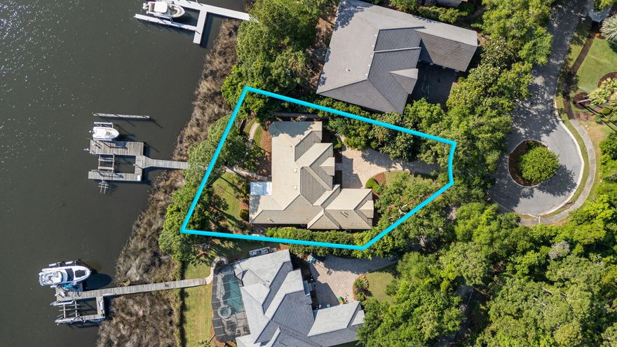 Calling all boating and fishing enthusiasts! Incredible price point on this rare, deep water bayou opportunity within the premier gated community of Kelly Plantation complete with dock, two boat lifts, slips and personal watercraft lift. Prime location allows quick access to the Choctawhatchee Bay for a fun boating day at Crab Island, Destin Harbor or head out to the Gulf and fish the emerald green waters. House is situated at the end of a cul-de-sac offering the utmost in privacy and comfort. Stunning architectural details flow throughout this custom build including raised ceilings, recessed lighting, built-in bookcases, crown molding, plantation shutters and granite counters. The living room and dining room with adjacent wet bar is the ultimate set up for entertaining with sliding glass doors that open onto the screened lanai offering even more chances to enjoy the water views and gorgeous sunsets. The heart of the home is the open concept kitchen, family room and breakfast nook offering the perfect gathering space. The kitchen boasts a gas cooktop, abundant custom cabinetry and counter space, walk-in pantry and large breakfast bar. Enjoy water views from the cozy breakfast nook with its large, mitered glass window. Family room has custom built-in cabinetry, gas fireplace, sliding glass door to lanai and expansive windows to take in the waterfront view. The master suite is a private retreat with water views, sliding glass door access to lanai, two walk-in closets and dressing mirror. Master bathroom includes recent updates to the flooring, counters, plumbing fixtures, lighting, bathtub and shower. There is a separate study just outside of the master bedroom and the additional bedrooms are on the opposite side of the home. Home is also equipped with a whole house Generac generator for added peace of mind. Kelly Plantation amenities include an 18-hole golf course, owner's club, fitness facility, tennis, pickleball, dog park, playground and nature trails. Convenient to world famous beaches, restaurants and shopping.