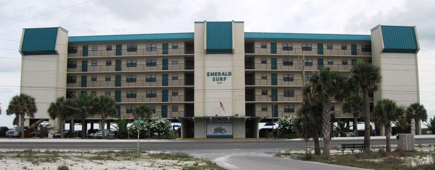 2/2 GULF-FRONT CONDO now available at Emerald Surf! 408 is on the west end of the 4th floor with great views and lots of privacy. U-shaped kitchen has ample cabinets and counter space plus a window over the sink with a view of the sound. Spacious living-dining room is nicely decorated with breakfast bar, hexagonal dining table, loveseat plus sofa-sleeper, 42'' flat-screen TV. Sliding glass doors from both living room and master bedroom open to the Gulf-front balcony which stretches across full width of the condo. Master bedroom has king bed, 32'' flat-screen TV, stack washer-dryer in closet. Master bath has double vanity and large tiled walk-in shower. Guest bedroom also has 32'' flat-screen TV. Beautiful sink in guest bathroom. This unit even comes with a library of great beach reads! Emerald Surf project amenities include a Gulf-side pool, ramped boardwalk to the beach, covered BBQ grill area, and covered parking on the ground floor beneath the building.

Exterior building refurbishment project completed at the beginning of summer 2016 with railings replaced, walkways refinished, and spalling repairs. Unit 408's share of special assessments for the building refurbishment have been paid in full. 

Navarre Beach is a leasehold.  The annual land lease fee is $250.  Ownership will transfer as an assignment of lease.

Buyer to verify all measurements and any other information deemed important.