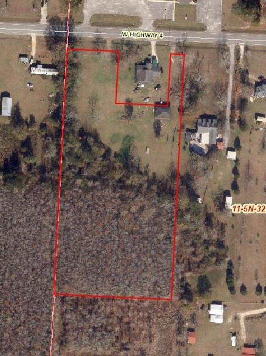 4.8 acres on Hwy 4 with over 175' of road frontage! The property features 2 acres of cleared, buildable land located in Flood Zone X, making it an ideal homesite for your future country retreat. With two driveway access points already in place, you'll have flexibility when planning your home placement and access.

City water and power are available at the road, helping simplify the building process.

The rear 2.8 acres consist of natural wetlands, providing a peaceful natural buffer that attracts wildlife and offers added privacy behind your homesite.

Conveniently located just steps from Travis Nelson Park and approximately ¼ mile from Northview High School & Bratt Elementary School, this property combines rural space with nearby community amenities.

Cont... Whether you're planning to build a custom home, weekend getaway, or simply want space to enjoy country living, this property offers both privacy and convenience. Located just 10 minutes from Atmore, Alabama and 15 minutes from Interstate 65, you'll have quick access to nearby towns while still enjoying the quiet of rural living.