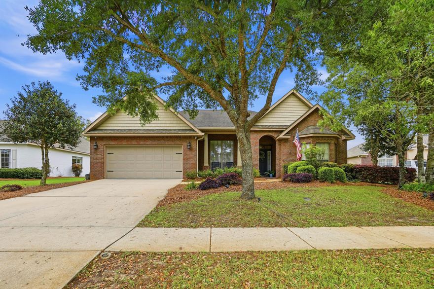 Welcome to this beautifully maintained home in Orchards at Hammock Bay, where modern style meets everyday functionality.  This thoughtfully designed property features three bedrooms plus a versatile flex room, large, laundry room, an eat in kitchen as well as a beautiful dinning room. At the center of the home, the spacious great room creates a warm and inviting gathering space, highlighted by a stunning shiplap fireplace. The open concept layout flows seamlessly into the spacious kitchen. The primary bedroom has a great sitting area or office nook. The generously sized back yard offers an oasis with a screen porch,paver patio and custom built pergola overlooking a the lake. New HVAC installed 2025. Hammock Bay offers pools, fitness, trails, dog park and many more ammenities.