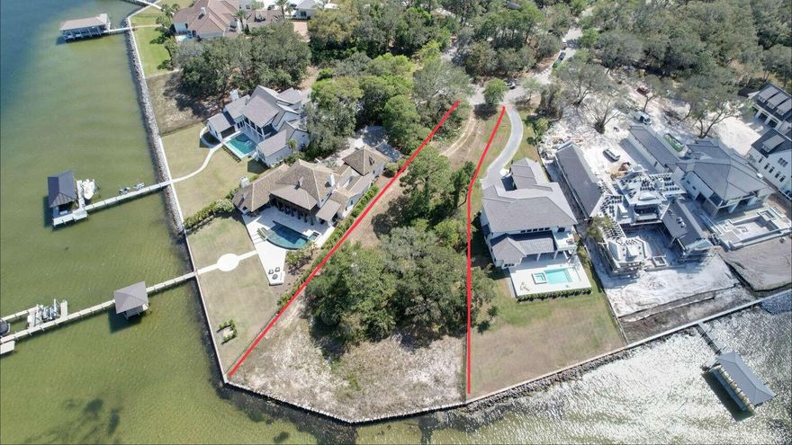 The parcel of land for sale is in The Estates at Indian Pointe which is a gated waterfront community with 13 homesites. This community is situated on the south shore of the 35 by 5 mile in dimension Choctawhatchee Bay. Lot 6 is the lot with the most bay frontage of all lots in the HOA with spectacular views to the east, north and west of the bay water. This lot is approximately 200 feet from a deep water channel to mid bay. These estate sized lots were designed for 5000 sq ft or more houses and currently there are 3 near by under construction. The neighborhood is rental restricted with a one year minimum. Owners in this community will have close access, by land or sea, to Destin harbor, Crab island, and the nearby gulf.