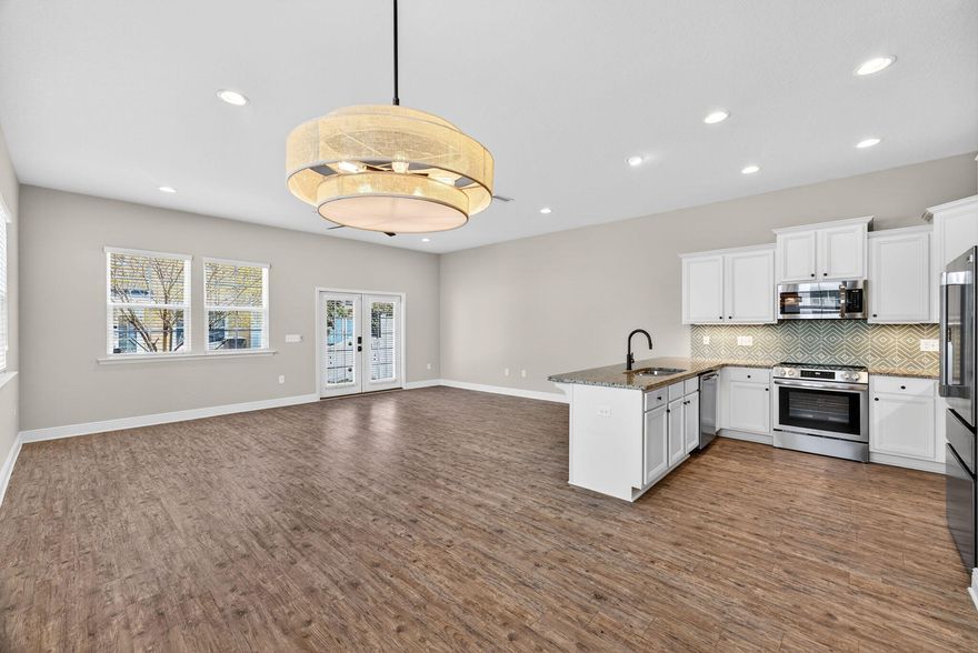 Discover coastal living at its finest at 110 Enchantment Falls Lane in Panama City Beach, Florida. This 2,093 sq ft home offers a seamless blend of style and comfort with an open floor plan, new interior paint, updated light and plumbing fixtures, and a brand-new stove and refrigerator. The first floor features soaring 10-foot ceilings, while the second floor maintains a spacious feel with 9-foot ceilings. With three bedrooms and two and a half baths, including a serene master suite, this residence ensures ample space and privacy. Just minutes from the beach and shopping, this move-in-ready home is a rare gem in a prime location. Contact us today to schedule a viewing.