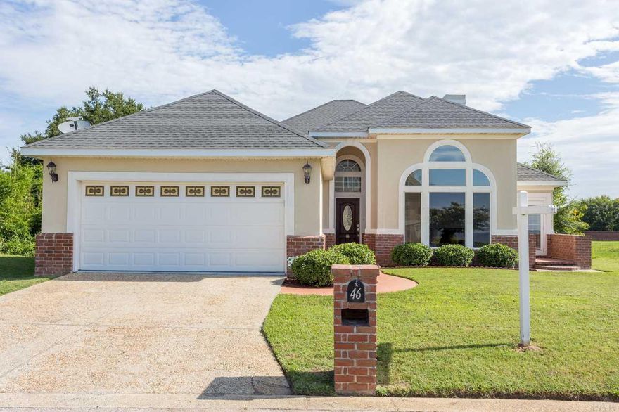 Wake up to panoramic views of Pensacola Bay right from your living room. This beautifully updated 3 bedroom, 2.5 bath home offers 2,368 square feet in the desirable Bay Winds community, perfectly positioned just minutes from downtown Pensacola and less than half a mile to Barrancas Park, Pensacola Country Club, Pensacola Yacht Club, and the marina. Step inside and you're immediately welcomed by soaring ceilings and an abundance of natural light. The 2023 top-to-bottom remodel truly sets this home apart. You'll find gorgeous plank tile flooring throughout, professional interior paint, tray ceilings, crown molding, energy-efficient LED lighting, and two updated gas fireplaces that create a warm and inviting feel. The kitchen is both functional and striking, featuring GE Profile appliances, marble countertops, a spacious island, decorative tile backsplash, and beautifully updated cabinetry. The primary suite has been thoughtfully enhanced with custom wood shelving in the walk-in closet and a stunning tile shower for a spa-like retreat. Major updates include a new roof in 2020, tankless water heater in 2022, and a whole-home dehumidifier added in 2023 for year-round comfort. Oversized south-facing windows provide breathtaking bay views, while French doors lead to a covered back patio that's perfect for relaxing summer evenings. Additional features include a two-car garage, attic storage with plywood flooring, Storm Stoppers hurricane shutters, and so much more. This is a rare opportunity to own a move-in ready waterfront view home in one of Pensacola's most sought-after locations. Schedule your private showing today before it's gone.