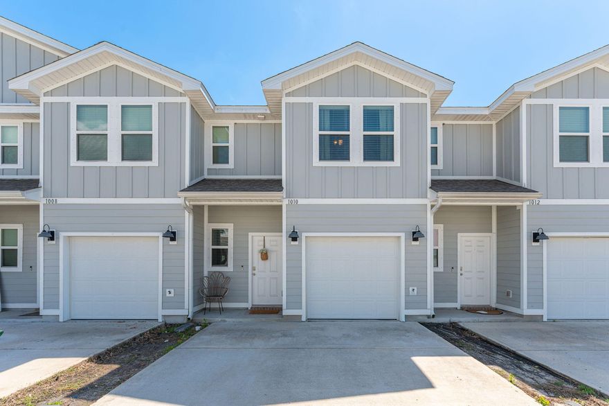 Welcome home to this meticulously maintained 2023 townhome in Cooper's Landing Community! Its open layout offers a comfortable space for living and entertaining, featuring 3 bedrooms and 2.5 bathrooms. The main level has easy-care LVP flooring with plush carpet upstairs. The kitchen and baths are equipped with granite countertops, complemented by all stainless steel appliances, quiet dishwasher, smooth top range, and a built-in microwave. An additional breakfast bar provides extra seating, along with a cozy dining area. A single-car garage offers added convenience. The durable Hardi Board exterior enhances the home's classic, attractive curb appeal. Located conveniently near Hurlburt and Eglin bases, shopping centers, medical facilities, beaches, and more!