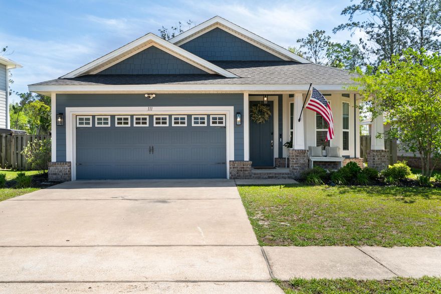 This beautiful craftsman style home is conveniently located with quick access to grocery store and restaurants as well as connection to Hwy 331 and 20 min drive to the Beaches of South Walton. This 3 bedroom 2 bath residence lives like a much larger home with an amazing floor plan that welcomes entertaining with great flow from dining area to large kitchen with expansive counter space and breakfast bar leading directly to the living area with charming fireplace.  Many elegant added features including tile backsplash in the kitchen, granite counter tops, ship lap accents and all updated lighting fixtures complete the warm and inviting look.  This peaceful gated neighborhood offers access to a community pool, fitness center, and scenic walking trails.