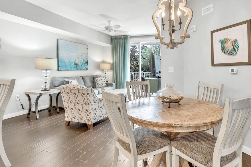 12 MONTH LEASE IN BAYTOWNE WHARF. Fully Furnished & All Utilities Included!! This second floor retreat overlooks the lush lawn area of the Grand Complex. This one-bedroom/one-bath has been thoughtfully refreshed with modern finishes, including updated flooring, designer lighting, and stylish furnishings. Spacious primary bedroom is filled with natural light and offers convenient access to the bathroom and hallway, while the living area features a sleeper sofa to comfortably accommodate additional guests. Community pool  & hot tub. The Village of Baytowne Wharf is a few steps away and features shopping, dining, live entertainment, kids activities, and special events. The Sandestin Marina and Marina Bar & Grill are a short walk and next to tennis courts and bike rentals! Come live the resort life!