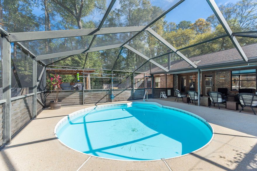 Situated on 1.38 acres in Pace, Florida, this well-maintained brick home offers 3 bedrooms, 2 bathrooms, and a 2-car attached garage, along with an impressive 30-by-36 detached workshop. A new roof installed in 2025 adds peace of mind, while the spacious layout provides both comfort and functionality.

Step outside to enjoy a private backyard retreat featuring an in-ground pool enclosed within a large screened porch, creating the perfect setting for gatherings or relaxing evenings. The property also includes an RV hookup and a generator plug with a transfer switch at the main power box for added convenience and preparedness.

With ample space, thoughtful features, and room to spread out, this property offers a unique opportunity to enjoy both indoor comfort and outdoor living.