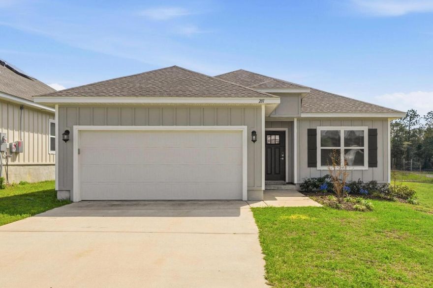 Freshly painted 3/2 in South Crestview and offers stylish updates throughout. The interior features fresh paint, a designer feature wall in the office, and a beautifully painted kitchen island that adds a custom touch to the heart of the home. The open kitchen is perfect for entertaining with white 42'' cabinets, quartz countertops, a breakfast bar, stainless steel appliances, and a spacious pantry. Laminate flooring in the main living areas makes the home both attractive and easy to maintain. The primary suite includes a large walk-in closet, en suite bath with a double vanity, a soaking tub, and a separate shower. The dedicated home office provides the perfect work-from-home setup. EV Car Charger. No Pets.