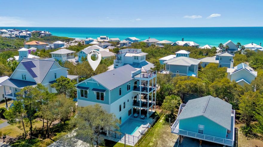 Welcome to 180 Betty Street, a newly completed coastal home located in the Gulfview Heights community of Santa Rosa Beach. Positioned south of 30A, within a breezy stroll to public beach access and nearby dining, this three-story residence offers a well-balanced combination of coastal design, functional layout, and modern finishes.
The home features 6 bedrooms and 6.5 bathrooms across approximately 4,444 square feet of heated and cooled living space, along with 1,230 square feet of covered balcony areas. A crow's nest lookout provides elevated Gulf views, adding a distinctive feature to the property.
Outdoor amenities include a heated saltwater pool and a fully fenced backyard, providing a private outdoor setting suitable for everyday use and gatherings. Interior finishes include pecky cypress ceilings, custom trim details, wide-plank LVP flooring, and paneled accent walls. A built-in bunk area adds flexible sleeping capacity, while custom closets and ample storage contribute to everyday functionality.
The kitchen is equipped with a full GE Café appliance package, including a cooktop, oven, refrigerator/freezer, microwave, vent hood, dishwasher, and ice maker. The primary suite includes private balcony access and a bathroom with a soaking tub and full-height tiled shower.
Construction details include Hardie siding, pressure-treated framing, and a metal roof designed for coastal conditions. Additional features include impact-rated windows, tankless water heaters, three high-efficiency HVAC systems, an irrigation system, and an automatic garage door.
The property is offered partially furnished and is ready for immediate occupancy.
Rental projections are included in the property documents. Please inquire for details and figures.
This home presents a flexible opportunity for use as a primary residence, second home, or vacation rental property.