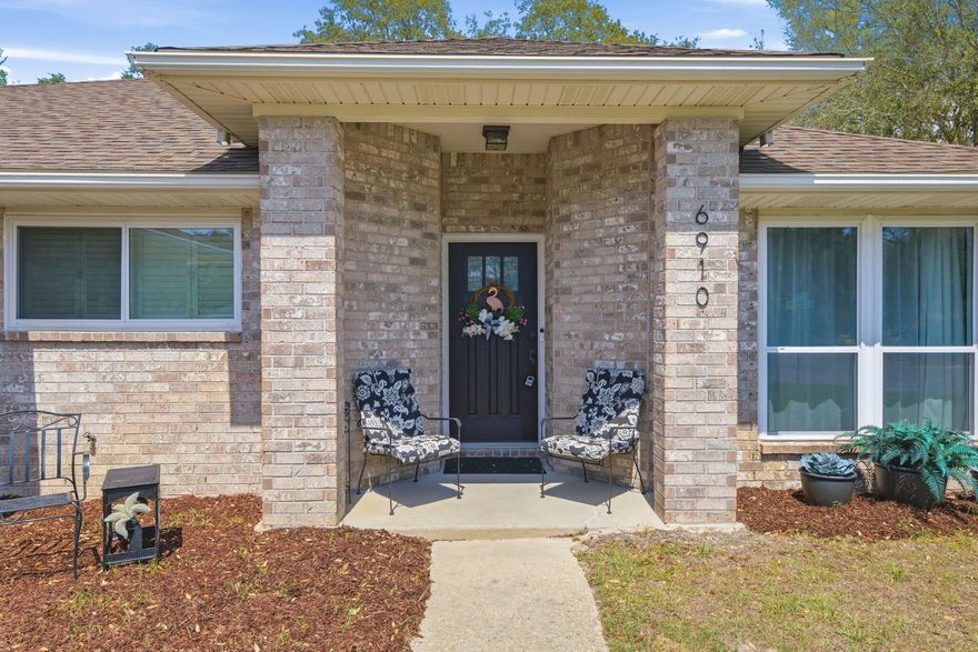 Welcome to Robledal Estates, one of West Navarre's most beloved and charming neighborhoods. Known for its winding, curvy roads, towering mature oak trees, and peaceful atmosphere, this community is full of life. Residents enjoy evening strolls, bike rides, and friendly dog walks beneath the beautiful oak canopy. Keep an eye out for the neighborhood's famous albino squirrels, a rare and fun sight that locals love to spot!

Located just 15 minutes from the beautiful white sands of Navarre Beach, this home also offers easy access to the sidewalks just outside the neighborhood that lead down East Bay Boulevard, perfect for walking, biking, or enjoying the coastal scenery. Situated on a large fenced corner lot at the entrance of a quiet cul-de-sac, this beautifully maintained all-brick home offers both privacy and space. The oversized yard provides plenty of room for your recreational toys--whether it's an RV, camper, or boat--and the deep driveway offers generous parking for guests and family.

Inside, the home features three spacious bedrooms with a desirable split floor plan, creating added privacy for the primary suite. The living spaces are warm and inviting, offering two dining areas perfect for entertaining or everyday family meals.

The oversized kitchen is truly the heart of the home, complete with a charming coffee bar area and a kitchen sink window overlooking the beautiful front yard. Elegant plantation shutters add timeless character and natural light throughout the home. Bedrooms feature carpet for comfort, while the main living areas are designed for easy maintenance and everyday living.

Step outside to enjoy the large backyard shaded by mature oak trees, creating a peaceful outdoor retreat. A storage shed conveys as-is, offering additional space for tools or lawn equipment.

Major updates provide added peace of mind, including a roof installed in 2021, along with newer HVAC and water heater Within the last 4 to 6 years, which may help contribute to lower insurance costs. The home also includes a double-car garage for added storage and convenience.

One of the many unique perks of Robledal Estates is the optional neighborhood water access through Crab Inc. Property owners have the opportunity to pay a one-time membership fee, which allows access to launch your boat within the neighborhood for a small usage fee.

Best of all, there are no HOA dues required to live in Robledal Estates, giving homeowners freedom while still enjoying the charm and character of this highly desirable community.

Homes in Robledal Estates are cherished for their mature landscaping, quiet streets, and unbeatable West Navarre location. This meticulously cared-for property offers the perfect opportunity to enjoy the lifestyle that makes this neighborhood such a hidden gem along the Emerald Coast.

Come see why so many people love calling Robledal Estates home.