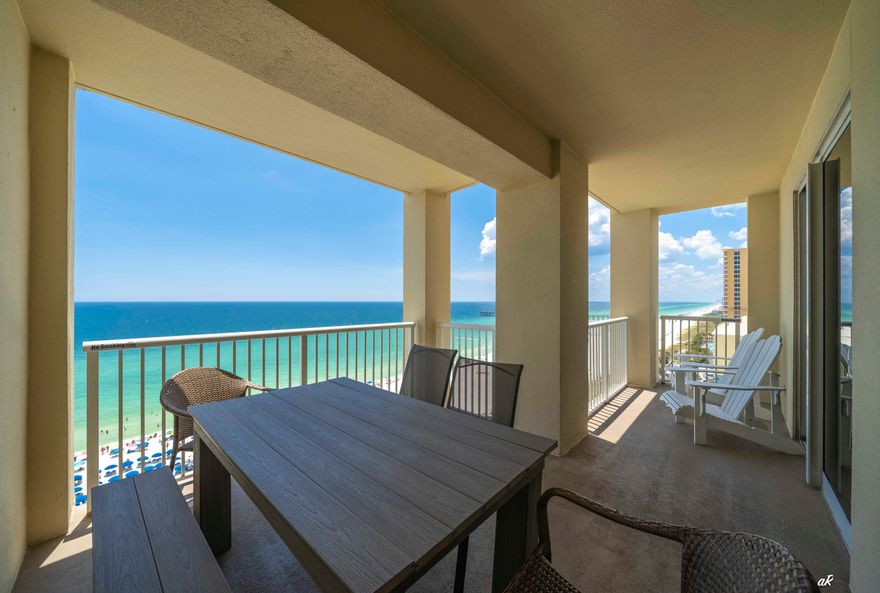 PRICE IMPROVEMENT 
Experience the ultimate in coastal living with this gulf-front condominium at Grand Panama Beach Resort, situated in the heart of Panama City Beach, Florida. This three-bedroom, two-bath residence offers panoramic views from every room and features an expansive balcony overlooking tranquil green waters--perfect for enjoying both sunrise and sunset. The open-plan kitchen is equipped with stainless steel appliances and granite countertops, seamlessly connecting to the living area for optimal entertaining.
The spacious primary suite boasts direct access to the Gulf-front balcony, an ensuite bathroom with dual vanities, a walk-in shower, and a soaking tub. The second bedroom also enjoys Gulf views and connects to a renovated guest bathroom featuring a large walk-in show Recent upgrades include a remodeled guest bathroom with new cabinetry, updated refrigerator and dishwasher, enhanced lighting, and a newer HVAC system.

Additional amenities include a dedicated storage closet rented for 2025, conveniently located just outside the unit for beach equipment. This property is offered fully furnished and is rental ready.

Grand Panama Beach Resort, one of the most sought-after resorts in Panama City Beach, offers 24-hour security services, two resort-style pools (one heated), a beachside tiki bar, a large fitness center, an onsite general store, a bistro restaurant, an owner's library, barbecue grills, and a level-5 walkway connecting Tower 2 to Tower 1. This meticulously maintained and updated condominium presents a unique opportunity to acquire your personal piece of paradise. Please schedule your private viewing today. While all information is deemed accurate, buyers should verify details that are of importance.
