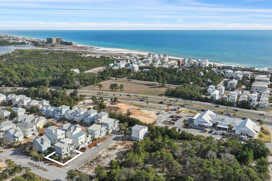 Just minutes from the white sand in Inlet Beach, this beautifully designed three-story coastal retreat offers the ultimate 30A lifestyle. Enjoy seven nearby public beach access points with parking and restrooms, the closest being access beside Camp Helen State Park, where the beach is wide open and less crowded. The new Highway 98 pedestrian underpass also provides safe, convenient access to both the beach and 30A, making this an ideal vacation getaway or investment property.  Built in 2018 and recently refreshed, this four-bedroom, four-bathroom home spans 2,196 square feet and comes turnkey and fully furnished, complete with a six-seat golf cart. Thoughtful updates include new exterior paint, wainscot in stairwells, new balcony decking, and new flooring on the second level, ensuring a move-in-ready experience. Inside, you'll find two living areas designed for comfort and entertaining. The first floor offers a cozy living space with a three-bunk bedroom, full bath, laundry, and patio access. The second floor includes an open-concept kitchen, living, and dining area with a balcony, plus a guest bedroom and full bath. The third floor hosts the primary suite with double vanities, walk-in closet, walk-in shower, and sun deck, along with an additional ensuite bedroom with deck access. This stylish home comfortably sleeps 11 or more guests and offers multiple outdoor spaces, including a balcony, deck, a fenced backyard patio, and low-maintenance artificial turf, making it easy for coastal living. Soak up the sun at the community pool shared by only a few homesites, bike to 30A , and enjoy the convenience of a rare two-car garage plus driveway parking for two to three additional vehicles. Stroll to nearby dining, boutiques, and cozy coffee shops, or take a quick bike, golf cart, or car ride to 30Avenue for even more shopping, dining and entertainment. With impressive rental projections of $65,000 to $97,000 annually, this turnkey beach retreat offers the perfect blend of smart investment potential and effortless coastal living. Discover the charm, convenience, and laid-back luxury that make Inlet Beach so special.  Buyer should verify all data and approximate dimensions, if important.