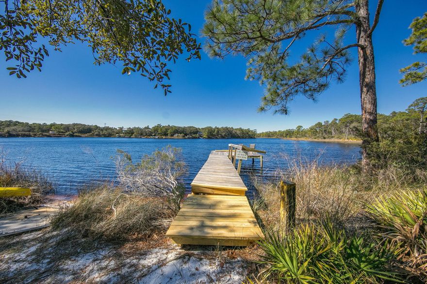 Searching for a condo near Eastern Lake on 30A with peaceful nature views and easy beach access? This second-floor 2-bedroom, 2-bath condo in Heron's Watch delivers the relaxed coastal lifestyle buyers come to 30A for. Perfectly positioned between Eastern Lake and Point Washington State Forest, the unit enjoys sweeping views of the 10,000-acre forest from the private balcony, creating a peaceful backdrop that's hard to find along the beach corridor. Even better, this unit has been completely remodeled from top to bottom--including new flooring, updated bathrooms, and a beautifully redesigned kitchen. The finishes strike the perfect light, bright coastal vibe with modern colors and style that feel fresh, clean, and move-in ready. The open living and dining area creates an easy flow for everyday living or hosting friends after a day at the beach. A washer and dryer are included, along with a private balcony storage room that's perfect for bikes or beach gear.
Outdoor enthusiasts love this location. Miles of hiking and biking trails connect just outside the community, and Deer Lake State Park is less than a mile away along the bike path, offering parking, restrooms, pavilions, and a scenic dune walkover to the Gulf.
Heron's Watch is a gated community on 30A with a swimming pool, surrounded by nature yet just minutes from the beaches, restaurants, and laid-back coastal lifestyle that make this stretch of Santa Rosa Beach so desirable.
This unit has never been used as a rental, but the location, layout, and proximity to the beach create excellent potential for short-term rental income for owners who wish to take advantage of the strong vacation demand along 30A.
If you've been searching for a 30A condo near Eastern Lake with trails, nature, beach access, and rental potential, this one is worth a closer look.