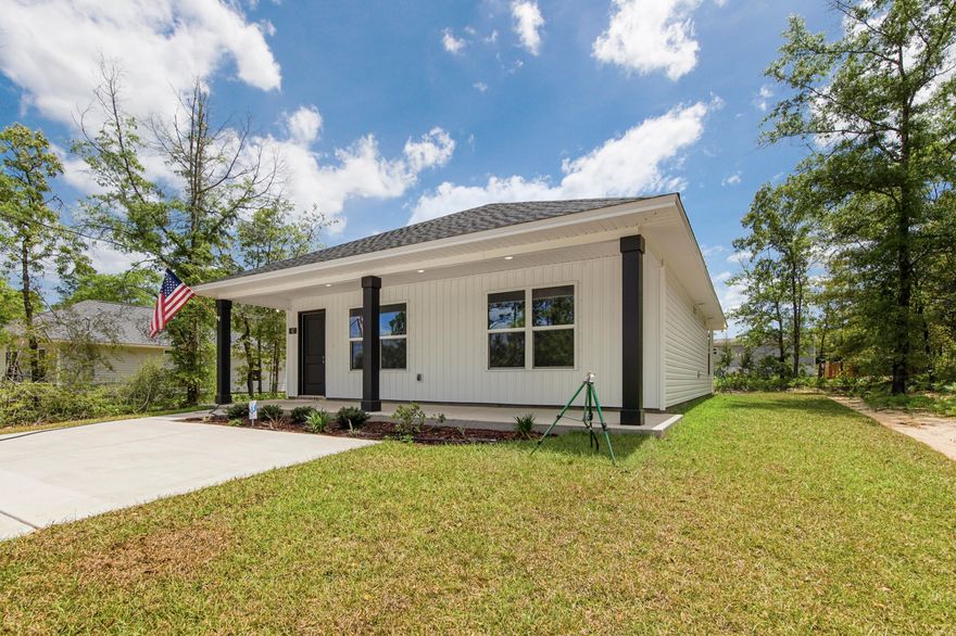Fresh, simple, and easy to love. This newly built home by Flynn Built welcomes you with an expansive front porch, offering 2 beds and 2 baths with a light, open layout that feels comfortable and livable. Inside, you'll find durable LVP flooring, granite countertops throughout, stainless appliances and a bright, airy feel that makes the space live larger than expected. The exterior features low-maintenance vinyl siding, making upkeep easy. Also included is a one-year builder warranty for added peace of mind. Plus, with a full-price offer, buyers receive $6,000 toward closing costs, making this a super option for first-time buyers, those downsizing, or anyone looking for a clean, move-in ready start.