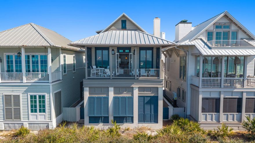 Perfectly positioned along the Gulf in the heart of Rosemary Beach, this beautifully renovated coastal retreat on Atwoods Court offers luxury design, exceptional views, and outstanding rental income. Completely reimagined with interiors by Heather Rowland of Heather Rowland Interiors, the home features all-new furnishings, designer lighting, fresh interior and exterior paint, new outdoor decking, and an updated HVAC system (2024-2025).

A charming private courtyard welcomes you between the main residence and carriage house, creating a peaceful entry to this elegant property.

The first level of the main home includes two bedrooms, including a stylish bunk room with walk-in closet and ensuite bath, and a spacious primary suite with soaring ceilings, a sitting area, Bahama shutters, and a luxurious bath featuring double vanities, soaking tub, tiled shower, and walk-in closet.
The second floor captures beautiful Gulf views and serves as the main gathering space with vaulted ceilings, fireplace, built-in speakers, reading nook, full bath, and an open living and dining area perfect for entertaining. The well-appointed kitchen offers bar seating, ample dining options, and convenient access to the laundry room.
The third level features an additional private bedroom suite with walk-in closet and a bathroom with double vanity and tiled shower.
Additional highlights include a two-car garage and a beautifully designed carriage house featuring a king bedroom, two loft beds, a full kitchen, and full bath AND a private balcony--ideal for guests or separate rental income property.
Located along scenic 30A and just steps from the Gulf, this exceptional property offers the perfect blend of luxury coastal living and strong investment potential.

Buyer to verify all data and dimensions.