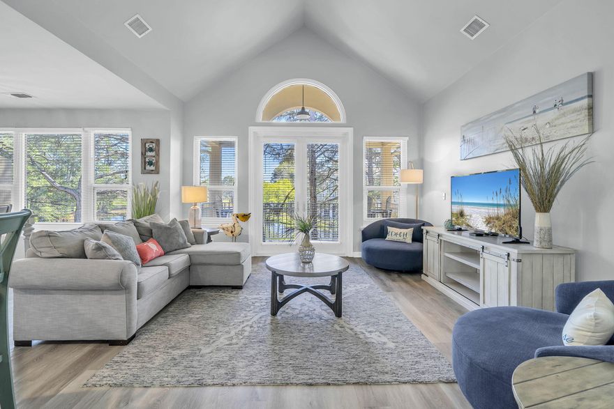 Welcome to Turnberry in Sandestin Golf and Beach Resort! This 2nd floor spacious three-bedroom, three-bathroom fully furnished condo offers coastal beach vibes with beautiful lake views.  Step inside and discover the perfect blend of style and comfort, with numerous recent updates. The updated flooring brings a fresh & beachy feel to the space and the kitchen has been beautifully transformed with updated cabinets and granite countertops. Situated in the popular Turnberry neighborhood of Sandestin, this location offers serene lakes, lush trees, and just a short walk to Baytowne Wharf.  A 2022 6-Seater Golf Cart is included along with parking and charging.  This condo can be a vacation home, short term rental property, or a permanent home!