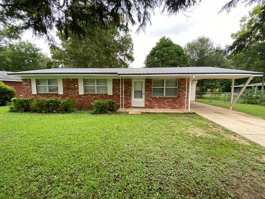Three bedroom 1.5 bath with a large fenced in back yard. No pets.
