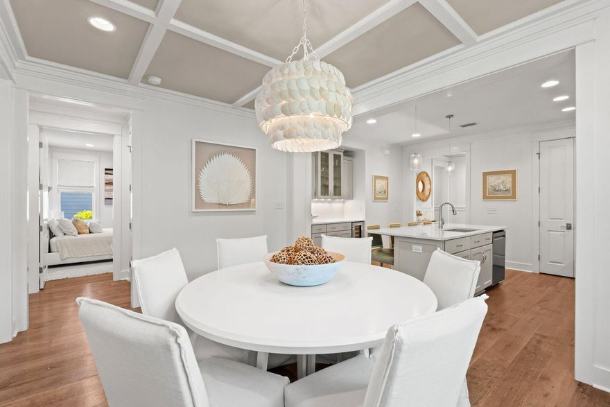Welcome to refined coastal living in the highly sought-after Watersound Origins community.
Nestled in a serene section of the neighborhood with charming gravel pathways that lead to
community amenities, this beautifully designed and meticulously maintained Huff home offers
an abundance of privacy, natural light, a thoughtfully crafted open floor plan, and high-end
finishes throughout.
Featuring three spacious bedrooms with generous closets and three full baths, this home is
designed for both comfort and functionality. The inviting living, dining and bedroom areas are
enhanced by ten-foot ceilings, rich hardwood flooring, custom wood ceiling details, and shiplap
accents that create a warm yet elevated coastal aesthetic. At the heart of the home, the chef's
kitchen showcases Cambria quartz countertops and backsplash, along with a seamless flow into
the main living space--perfect for everyday living and effortless entertaining. The spacious
primary suite serves as a serene retreat, featuring a wood ceiling that adds warmth and a sense of
luxury and relation, complemented by a spa-like bath and ample closet space. Additional
highlights include a remodeled laundry room and a garage with built-in cabinetry for added
storage and organization.
Step outside to enjoy a beautifully designed outdoor living space featuring a serene screened
porch, an expanded paver patio, and a lushly landscaped yard--creating a private and inviting
setting ideal for relaxing or entertaining guests.
Watersound Origins is renowned for its picturesque surroundings, world-class amenities, and
unmatched sense of community. Residents enjoy access to a par-3 golf course, kayaking and
paddleboarding in Lake Powell, a resort-style pool, tennis and pickleball courts, a state-of-the-art
fitness center, scenic walking and biking trails, and a vibrant Village Commons with regular
community events. Just a short bike ride or drive to the pristine beaches of 30A and the Gulf of
Mexico, this location offers the perfect blend of tranquility, convenience, and coastal lifestyle.
This exceptional home presents a rare opportunity to own in one of the area's most desirable
communities--where luxury finishes, thoughtful design, and an unparalleled lifestyle come together seamlessly.