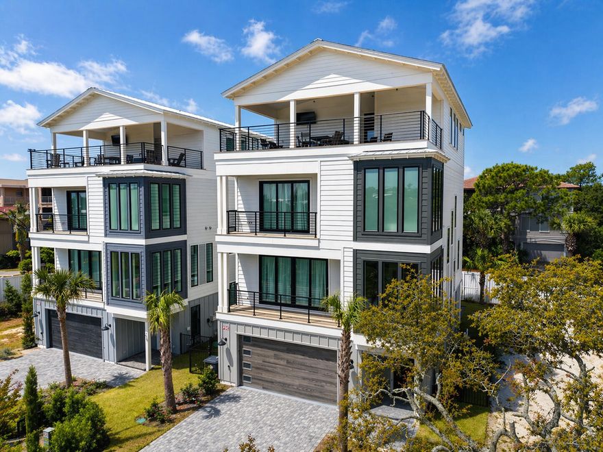 Brand-new and just finished, this four-story beach retreat sits south of Scenic Highway 30A on Mary Street, less than a 5-minute walk to the white sand beaches and emerald green waters of Blue Mountain Beach, Fla. Designed as a true rental powerhouse with projections around $235,000, this 5BR/5BA+2 half bath home is built for fun, comfort, and income. The first level lives like a poolside cabana, with a mini kitchen, half bath, and a full wall of sliders that open straight out to the private pool and sun deck—perfect for entertaining. Upstairs, the main living floor offers a large open kitchen, dining, and living area with Thermador appliances, a gas range, a sweeping island, and a walk-in pantry, ideal for big groups to gather. The whole second floor is dedicated to this open