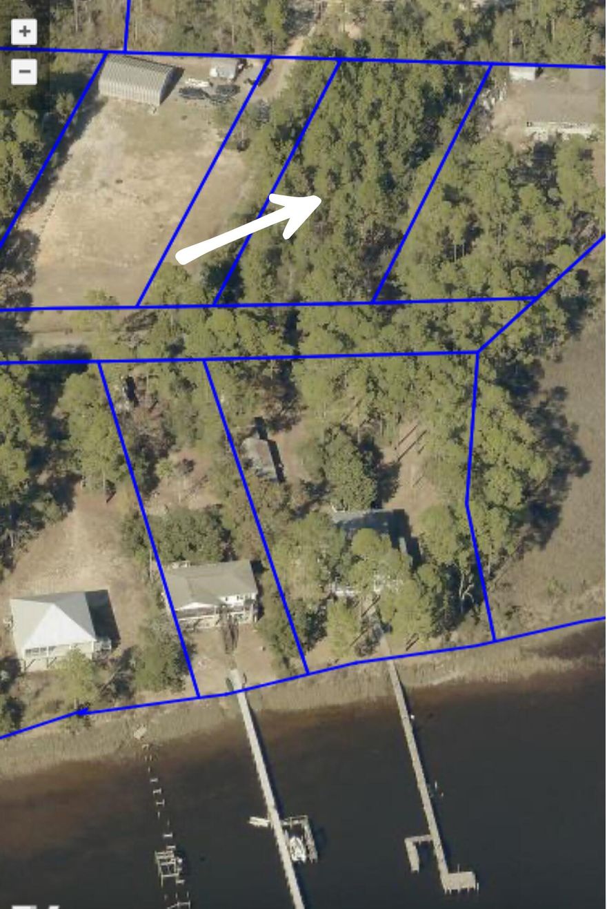 This vacant land offers a rare opportunity for residential development featuring stunning water views in a highly desirable location. Whether you are looking to build a custom home or invest in prime real estate, this property provides exceptional potential.
please be advised that there is a deep water well and a septic tank located on the property.
At this time, the age and condition of both the well and the septic system is unknown.